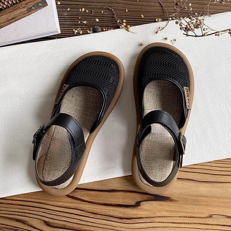 Marigold wide fit cushioned adjustable sandals in black on a light background