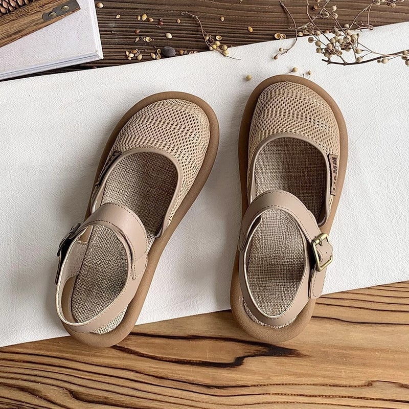 Close-up of the cushioned footbed and adjustable strap detail on the Marigold sandal