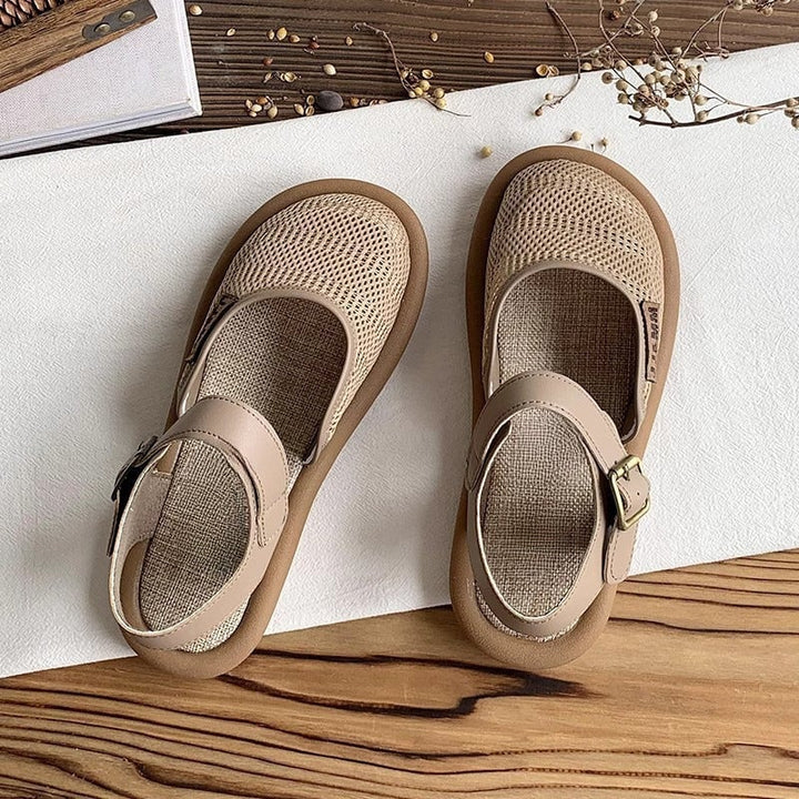 Close-up of the cushioned footbed and adjustable strap detail on the Marigold sandal