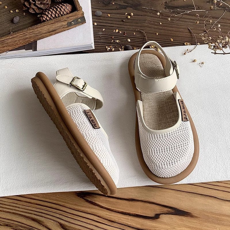 White Marigold wide fit sandals laid flat on a neutral surface