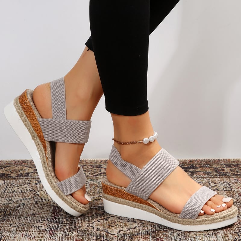 Marigold cushioned sandal in blue displayed on a light surface