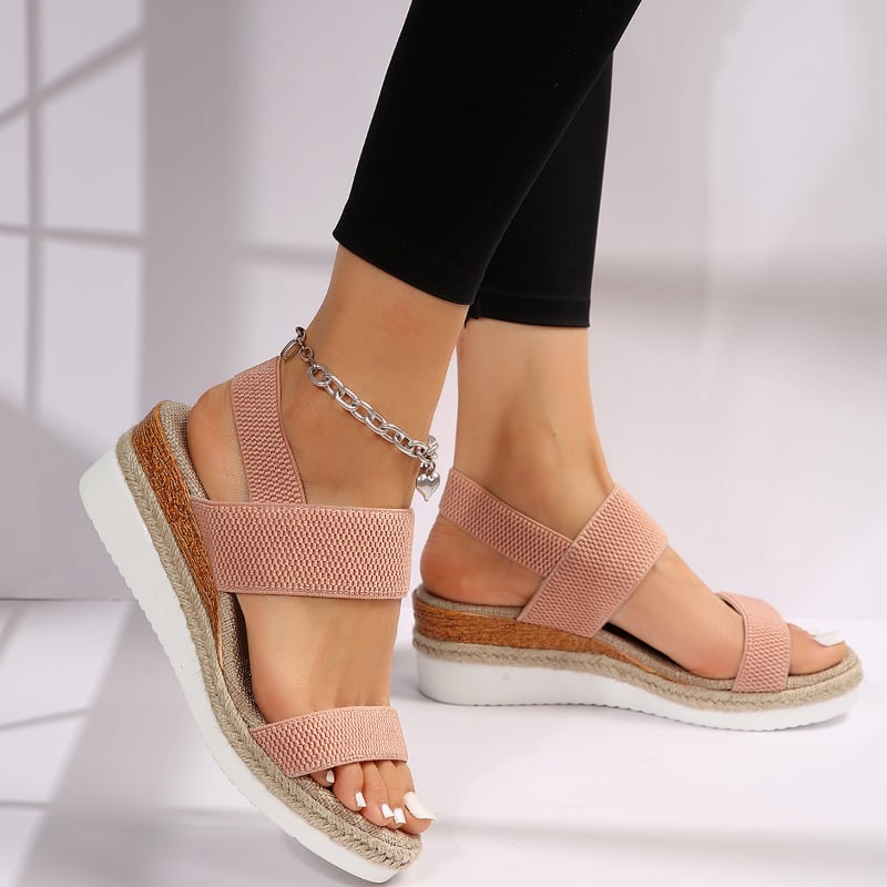 Side angle of Marigold sandal in blue showcasing lightweight sole and strap silhouette