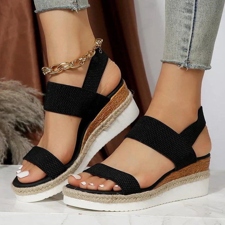 Close-up of Marigold gray sandal strap and cushioned footbed detail
