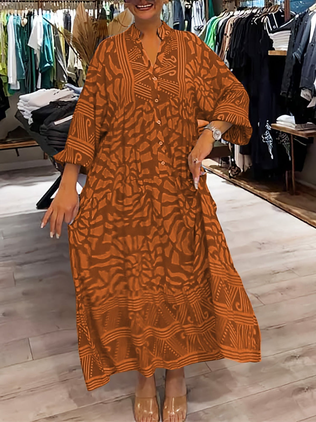 Marigold loose-fit dress in purple shown in a lifestyle setting, front-facing full-length view