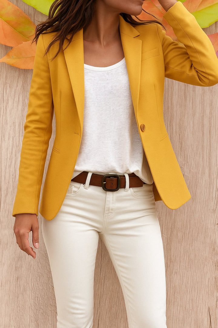 Close-up of the Marigold blazer in light blue showing tailored lapels and long sleeve detail