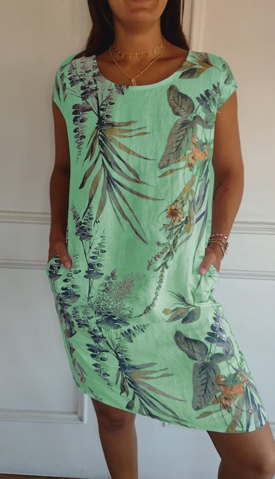Full-length shot of the Marilyn round neck dress in a vibrant color option