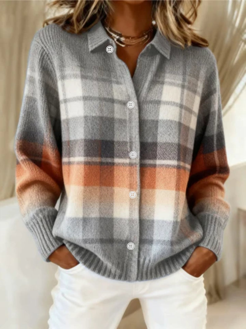 Woman wearing a multicolored checkered blouse with a relaxed, flattering silhouette in crisp lightweight fabric