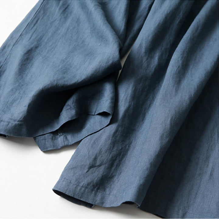 Side view of yellow wide-leg relaxed pants showing breezy wide-leg shape