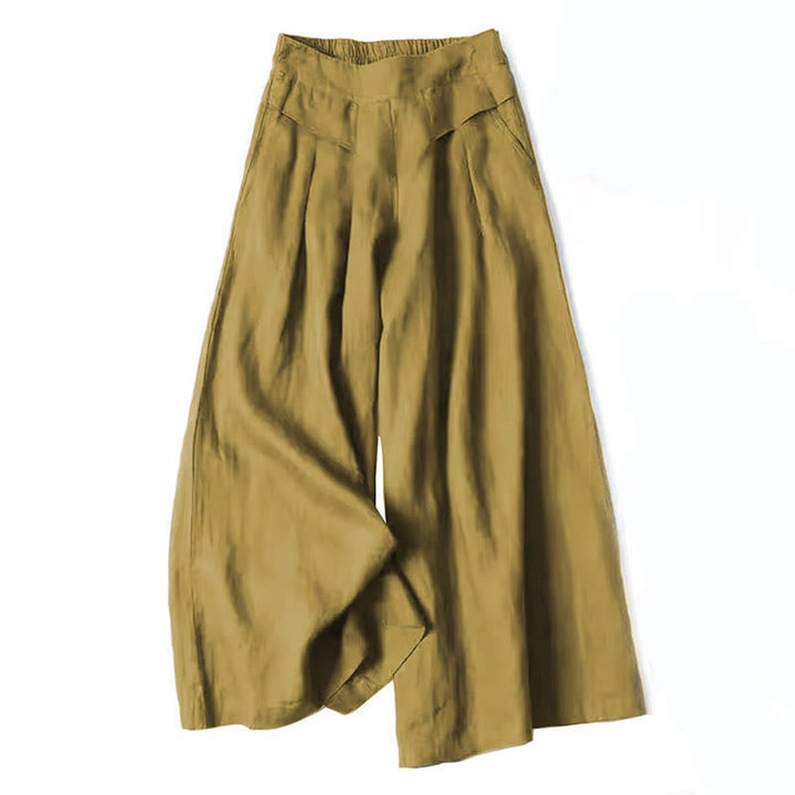 Flat lay of wide-leg relaxed pants in beige on a neutral background