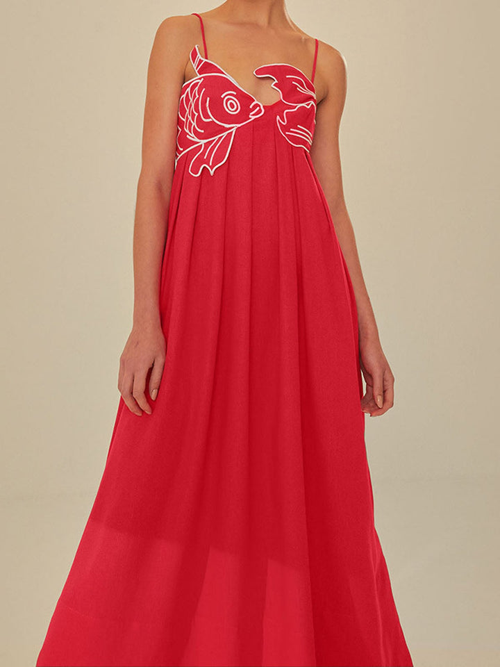 Full-length side view of the Marisol red maxi dress showing the flowing shift silhouette and floor-grazing length