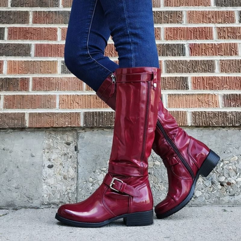Classic round toe knee-high boots in a sleek silhouette shown from the front, available in multiple colors