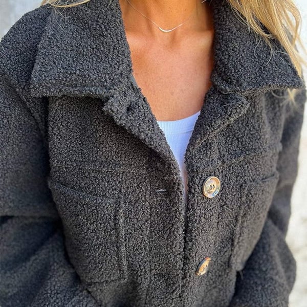 Model wearing the Marleau jacket in yellow paired with jeans, showcasing a relaxed city-ready outfit