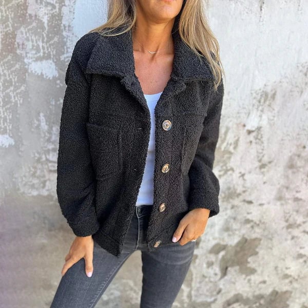 Back view of the Marleau lapel collar jacket in black showing the clean tailored silhouette