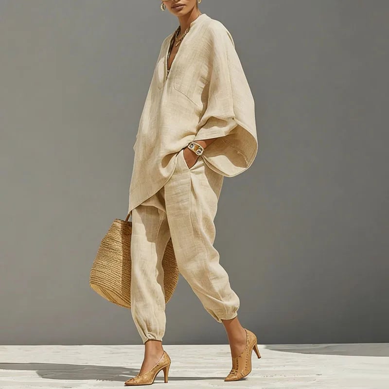 Close-up of the batwing sleeve detail on the Marlowe two piece set in apricot