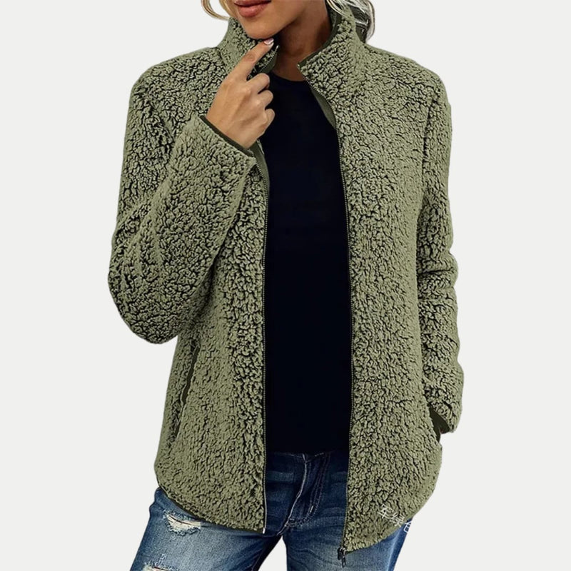 Model wearing the Marsha jacket in a bold color option, demonstrating its versatile styling potential