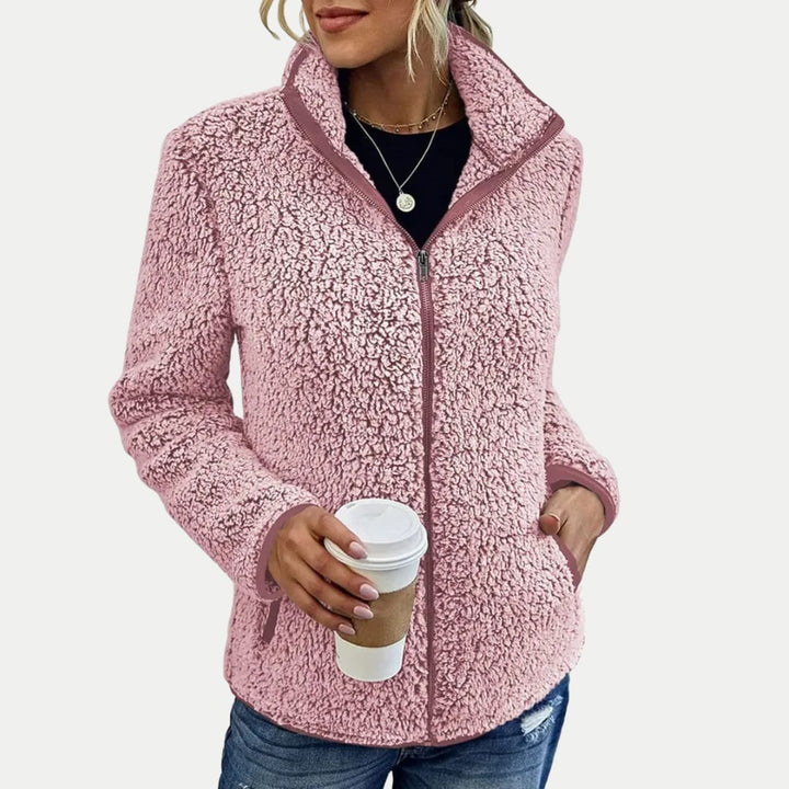 Back view of the Marsha elegant casual jacket showing its clean cut and comfortable layering fit