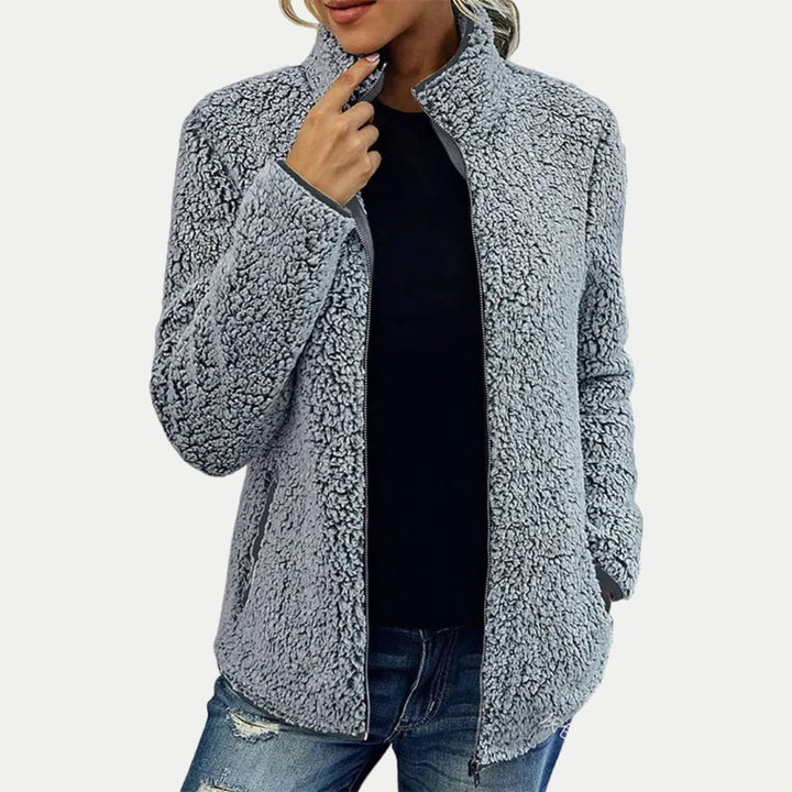 Side profile of the Marsha elegant casual jacket showing its relaxed non-bulky silhouette