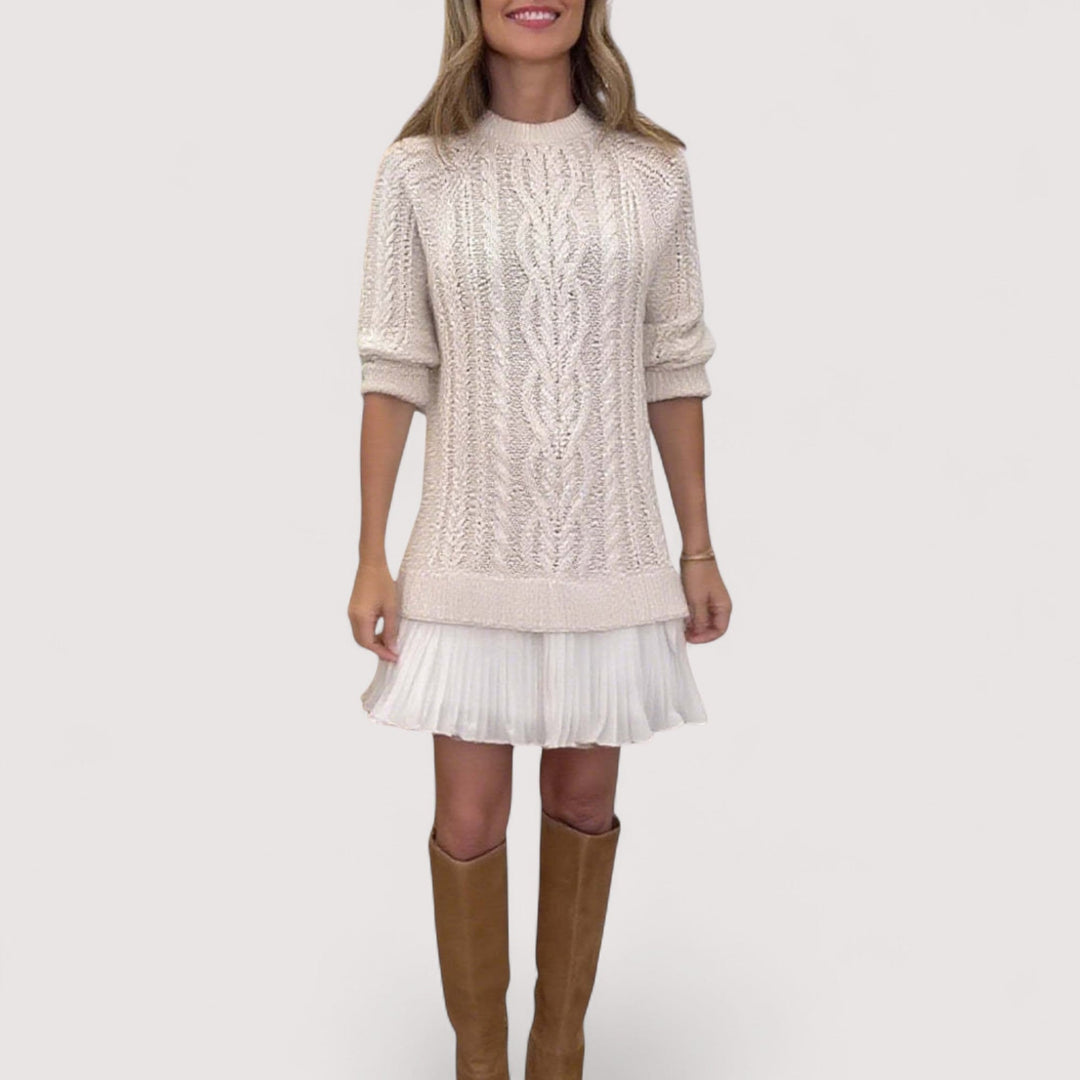 Woman wearing a chic everyday knit dress in a neutral tone, showcasing a smooth flattering silhouette