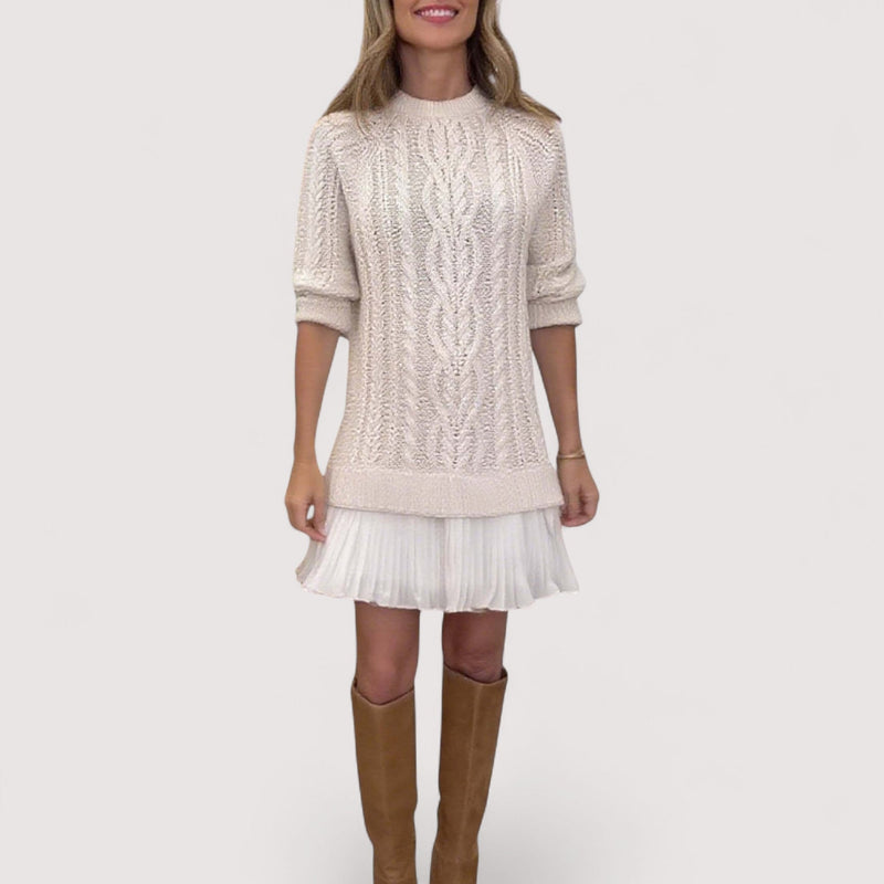 Woman wearing a chic everyday knit dress in a neutral tone, showcasing a smooth flattering silhouette