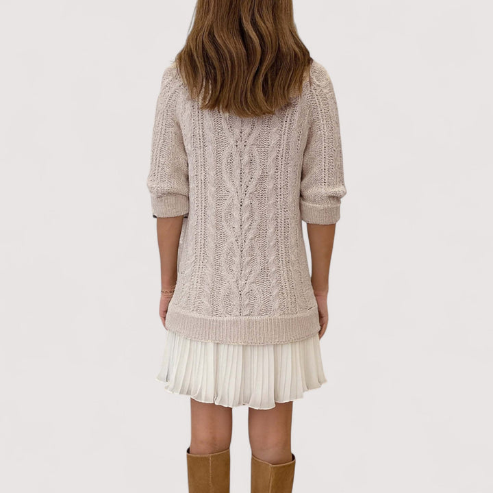 Side profile of the Martha everyday knit dress showing drape and length
