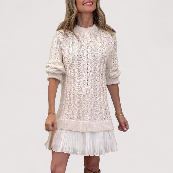 Lifestyle shot of the Martha chic knit dress styled for an evening occasion