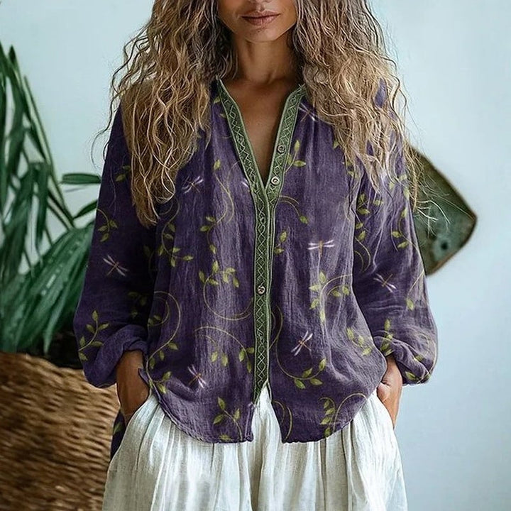 Front view of the Martha relaxed nature print blouse in purple with a flowing silhouette