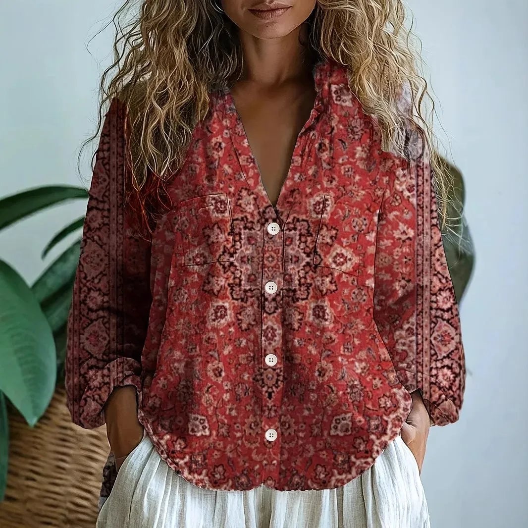Back view of the Martha nature print blouse showing the relaxed cut