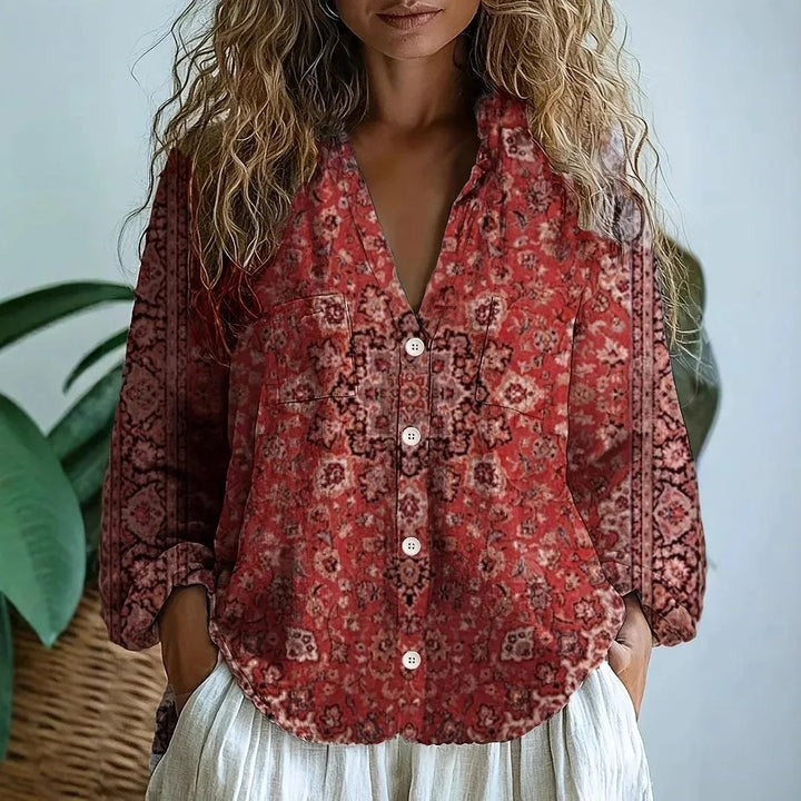 Back view of the Martha nature print blouse showing the relaxed cut