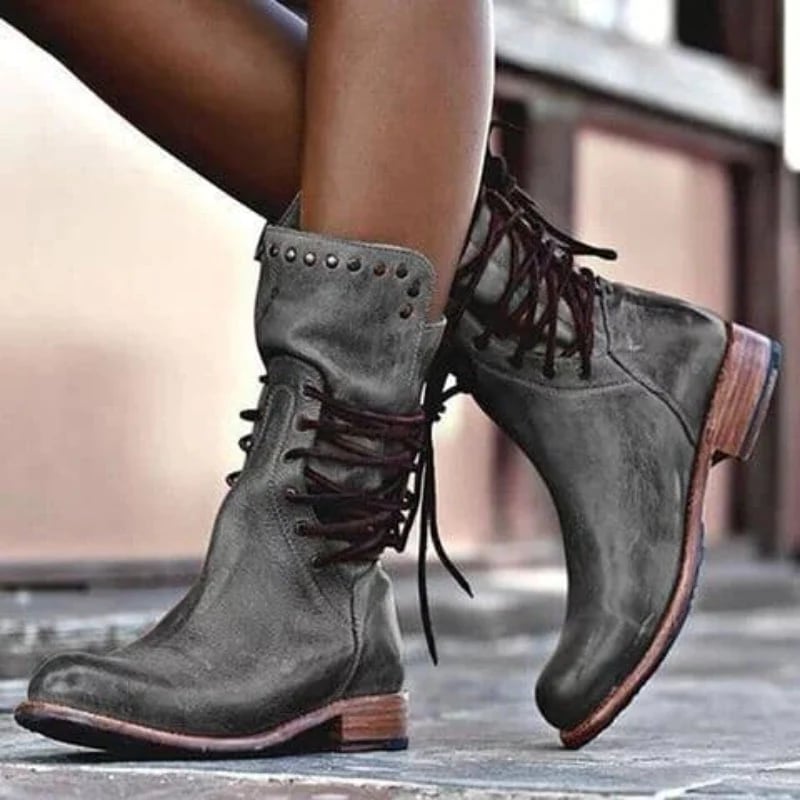 Side profile of women's classic comfort boot in grey showing the full boot silhouette and supportive design