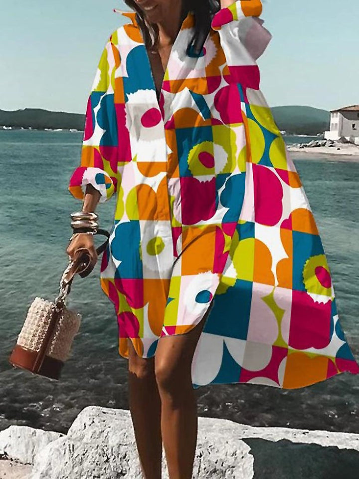 Close-up of the lightweight breathable fabric and button-down front detail of the summer midi shirt dress