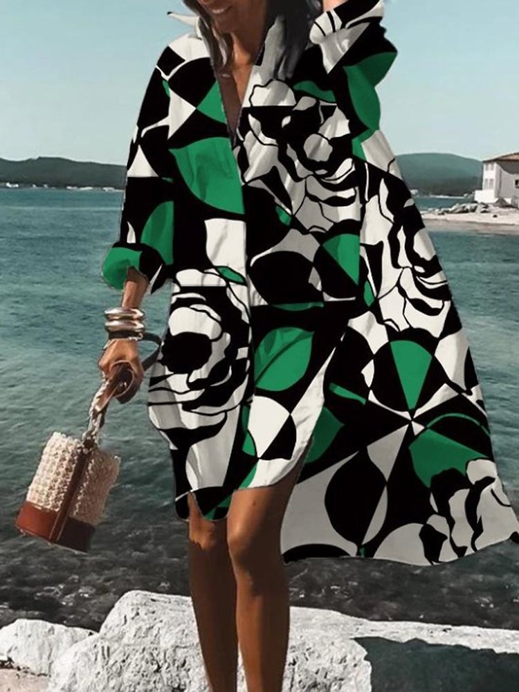 Back view of the summer midi shirt dress highlighting the flowing midi length and loose fit