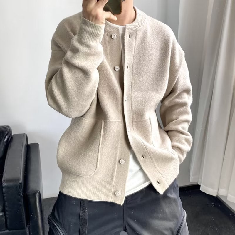 Mason cardigan styled casually over a tee, shown in a neutral beige colorway