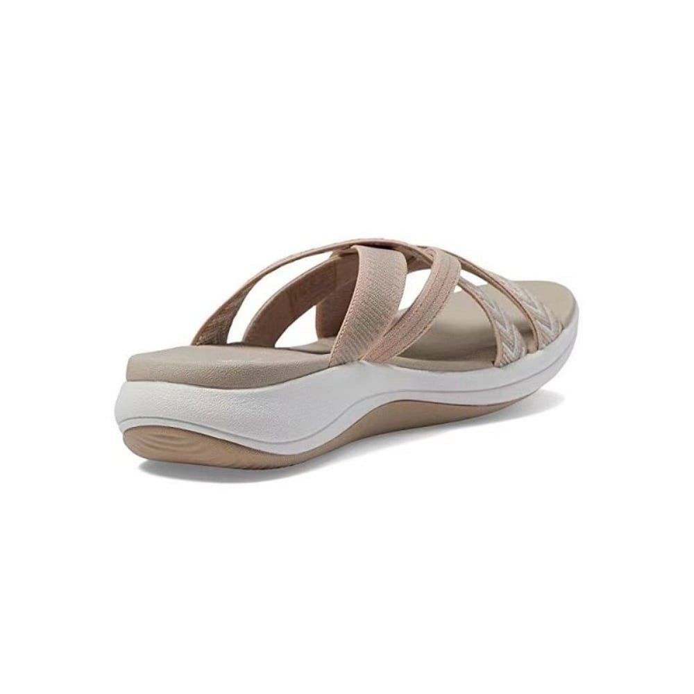 Close-up of Matilda blue sandal strap hardware and cushioned insole detail