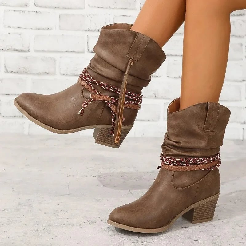 Dark brown western boots shown from the back highlighting heel construction and stitching