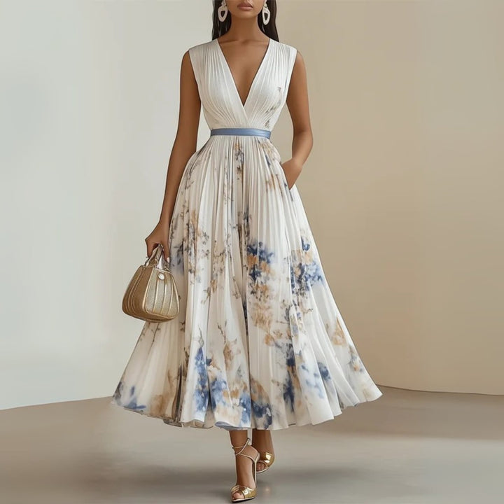 Front view of the Maureen maxi dress in pink showing the flattering V-neckline and flowing silhouette