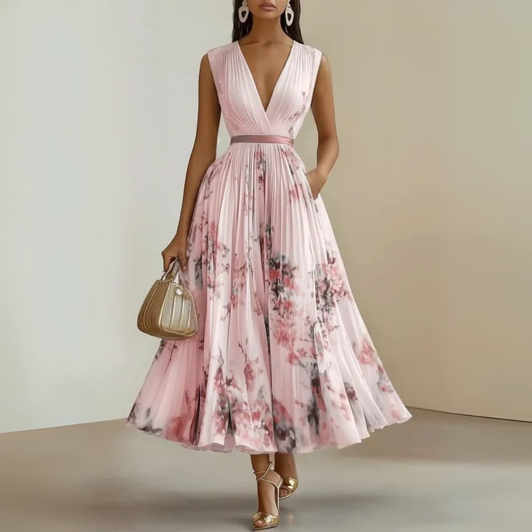 Side profile of model in yellow flowy maxi dress highlighting the breezy, no-cling skirt drape