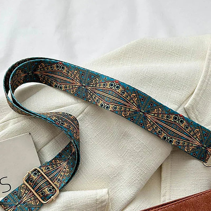Brown classy fashion bag showing exterior pocket detail