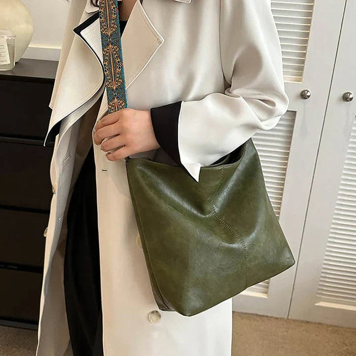 All four color options of the classy fashion bag: brown, black, beige, green