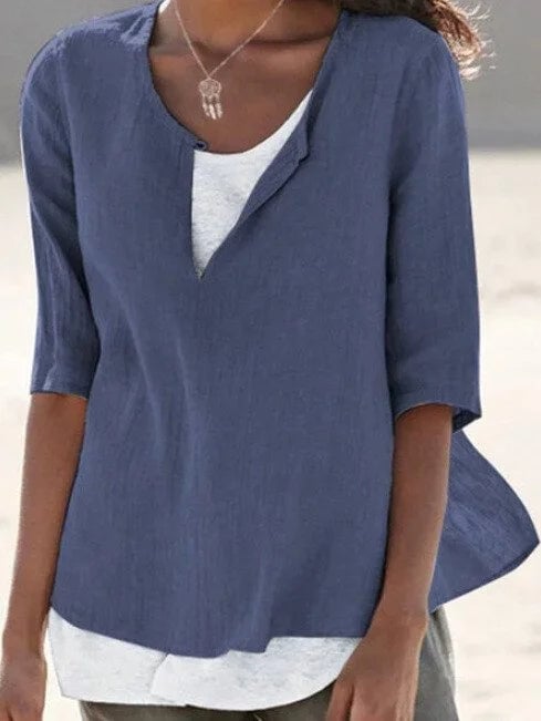 Maya linen blouse in light green styled with slim-fit pants for a casual daytime look