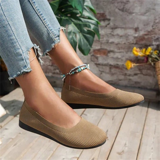 Maya knit slip-on ballet flat in beige shown from a front three-quarter angle on a clean white background