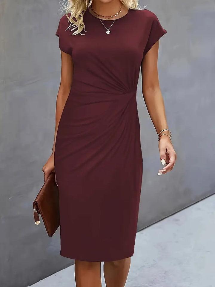 Front view of the Maya ruched midi dress in red