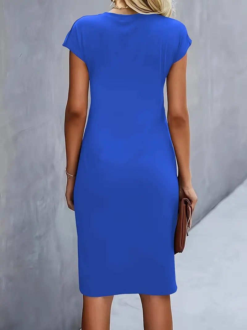 Full-length view of the Maya midi dress in beige