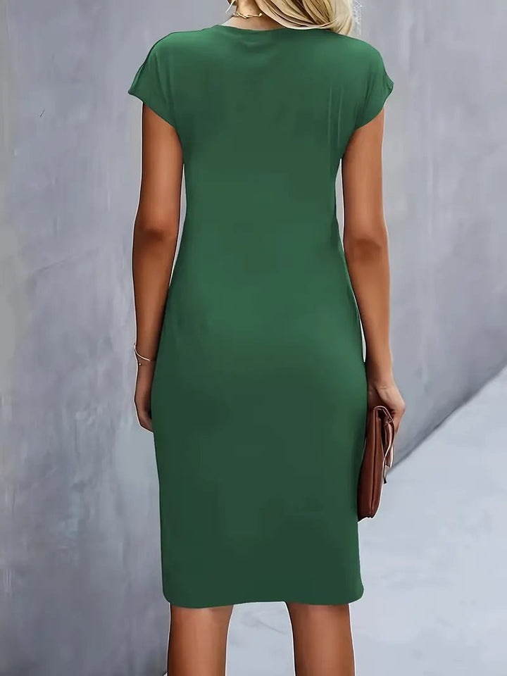 Front view of the Maya ruched midi dress in navy blue