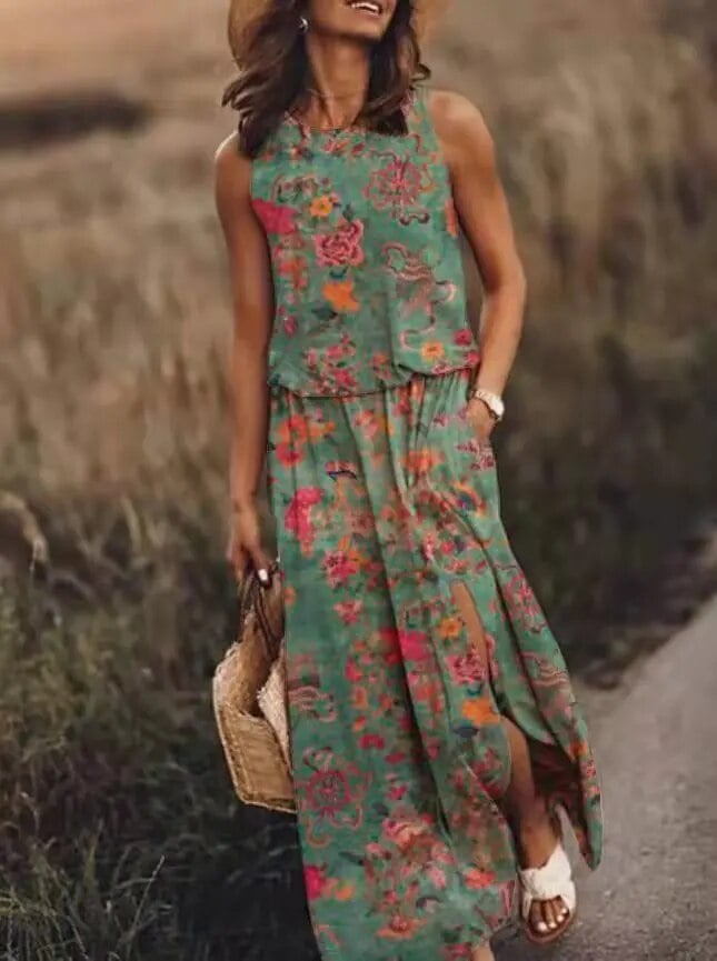 Woman wearing the Maya maxi dress in light green styled with strappy sandals outdoors