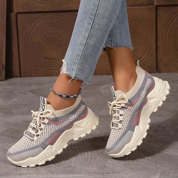 Meadow women's breathable mesh walking sneakers in beige, styled on model with casual outfit