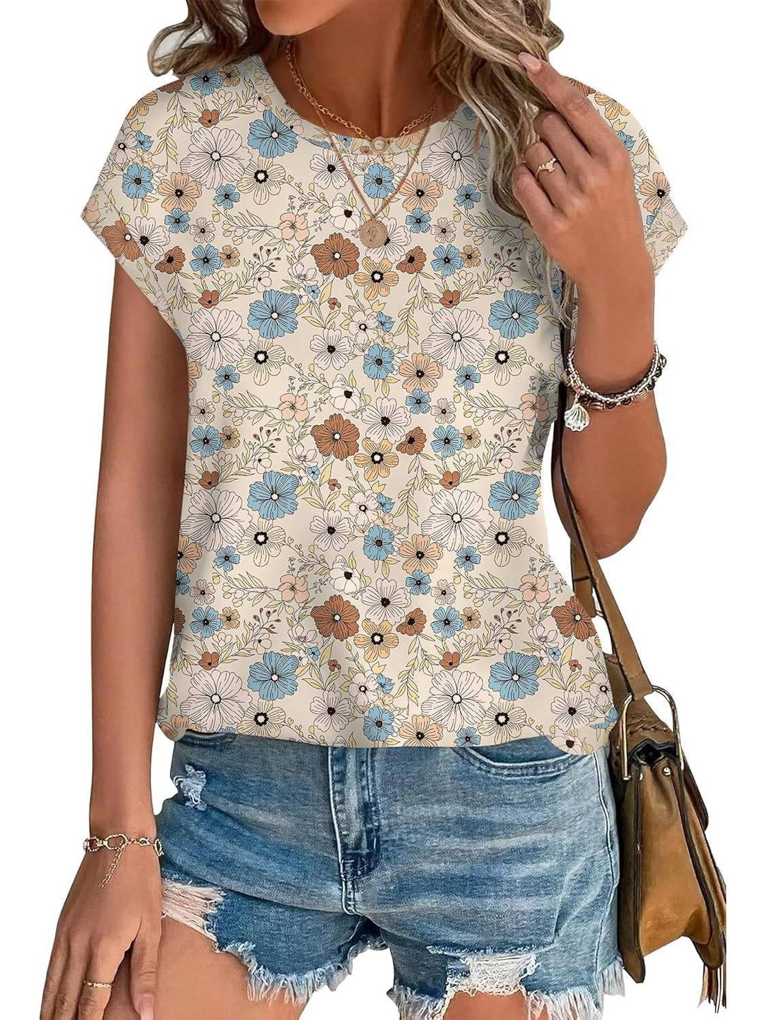 Women's Meadow leaf print top styled with denim shorts and white sneakers