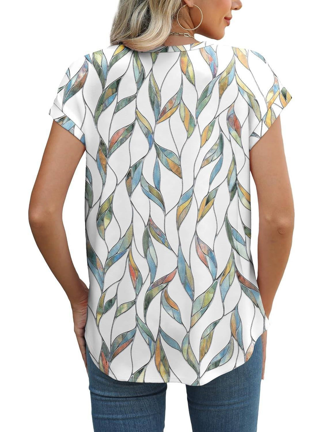 Women's leaf print top in pink blue flower colorway on model