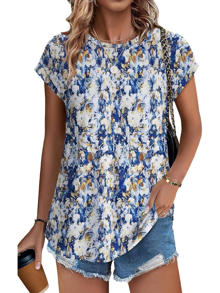 Women's casual top in sunflower print colorway styled with linen pants