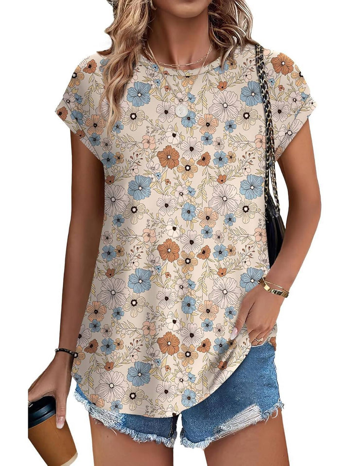 Flat lay of women's cap sleeve top in blue floral print on neutral background