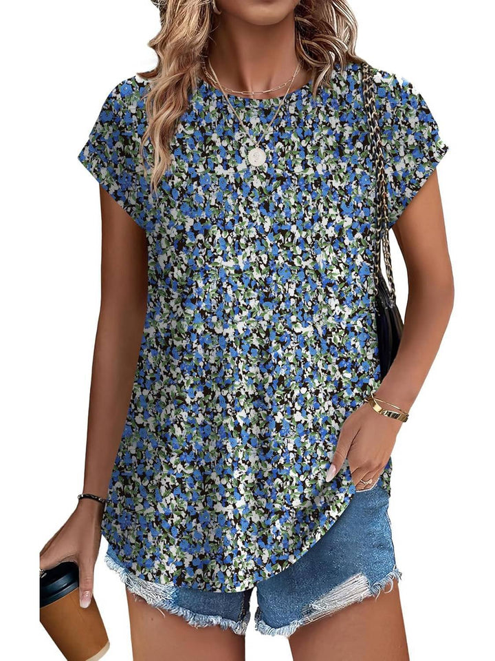 Group flat lay of all six print colorways of the women's leaf print cap sleeve top